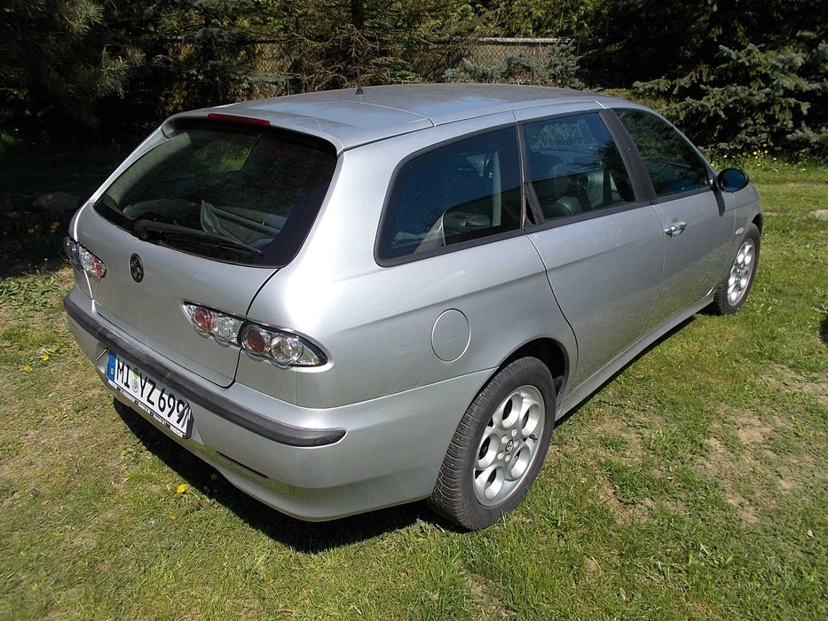 Alfa Romeo 156 1.9 JTD 110 KM Skóra Grigio chiaro 612 zderzak