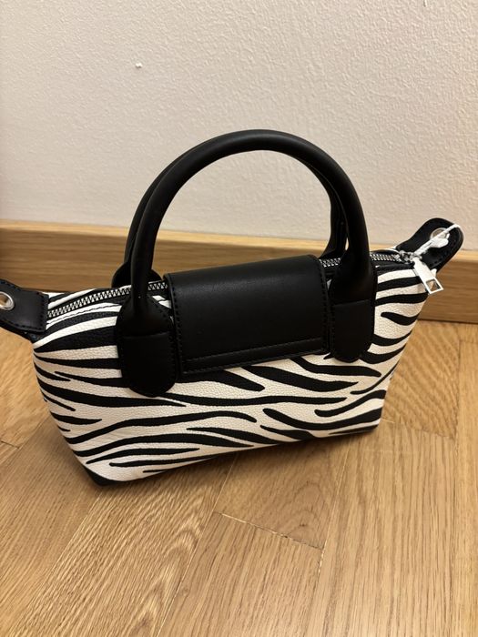 Mala padrao animal print/zebra em preto e branco, tamanho S.