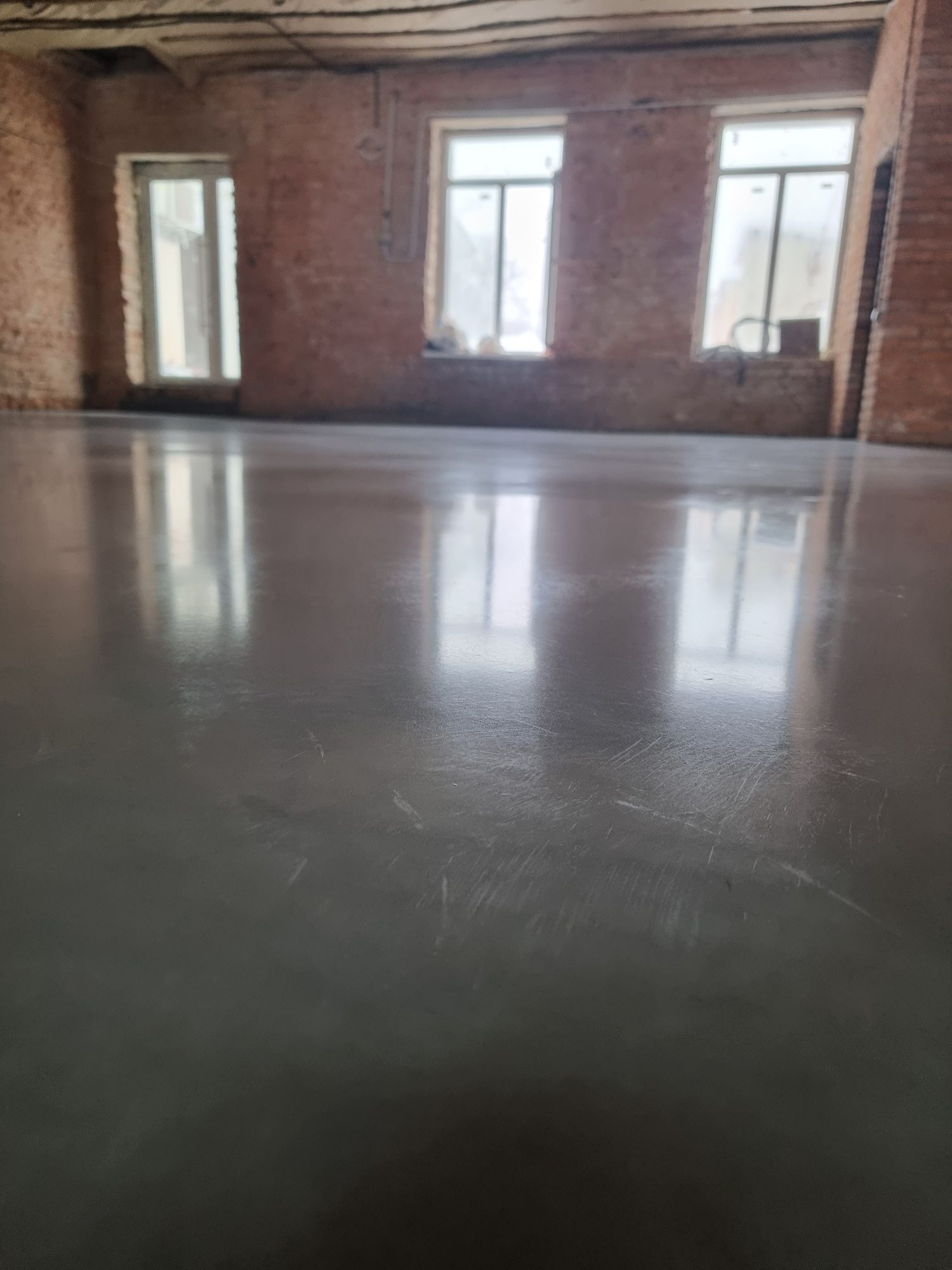 Промислова підлога бетонна стяжка підлоги механізована