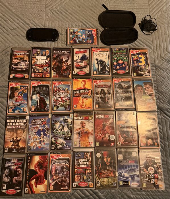 Vendo PSP + 26 jogos originais + bolsa e carregador!!