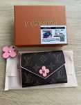 Женмкий кожаный кошелёк Louis Vuitton