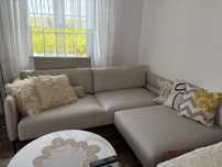 Sofa rozkładana z pufą