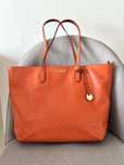 Coccinelle pomarańczowa skórzana torebka shopper