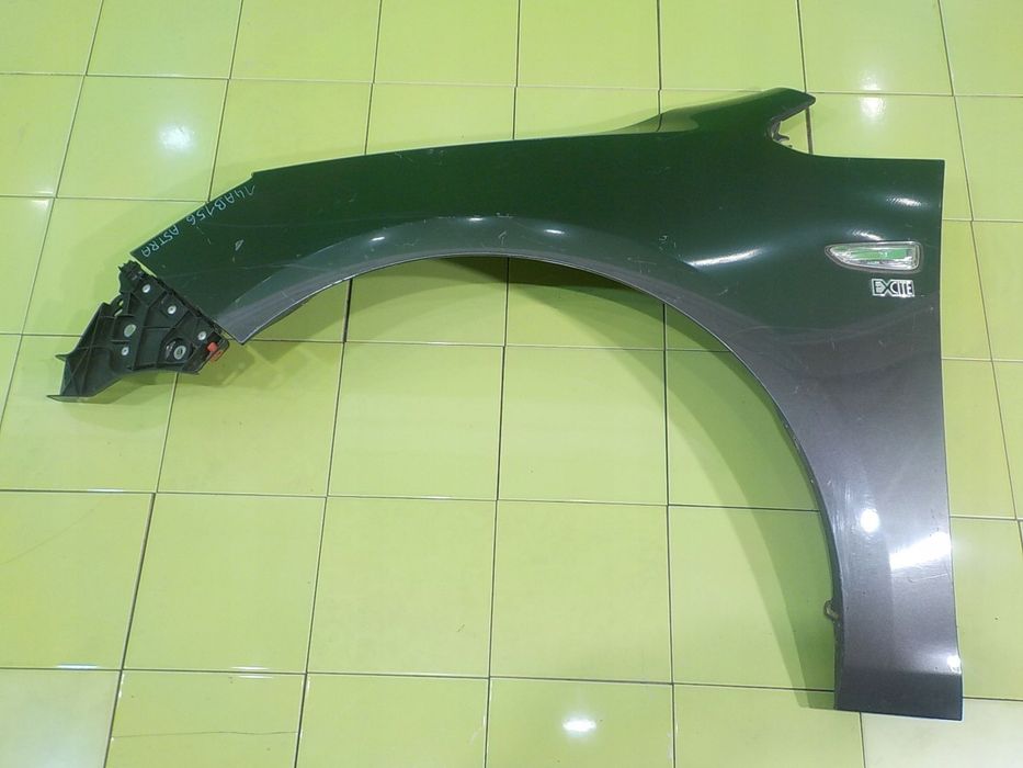 OPEL ASTRA IV J 1.6 B 11r 5D blotnik lewy przod