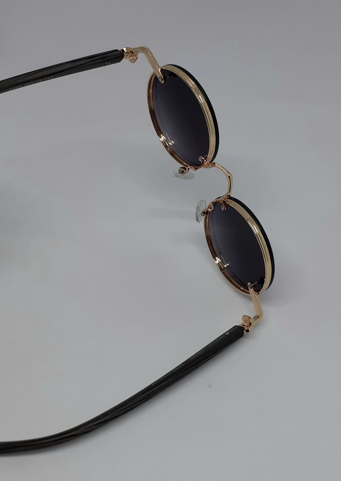 Cartier очки круглые женские черный градиент в золотом металле