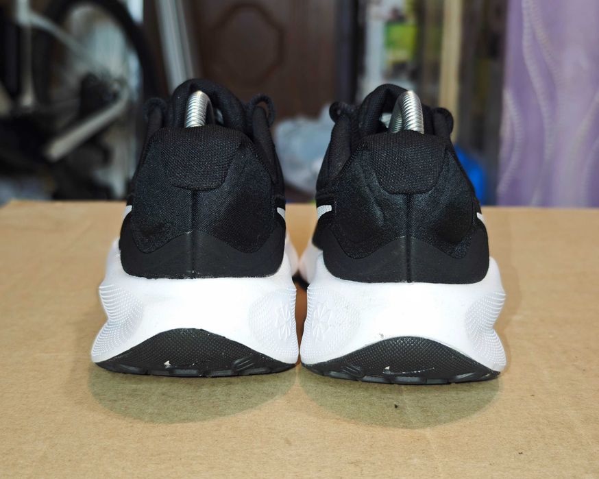 Оригінальні Кросівки Nike Revolution 7