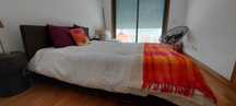 Cama e mesas de cabeceira