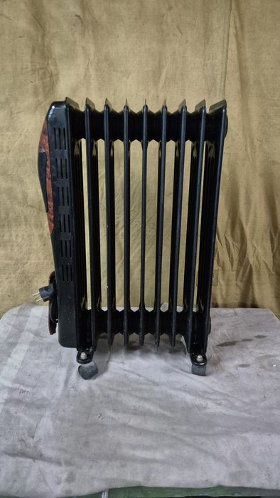 Масляний обігрівач,доставка.чорний