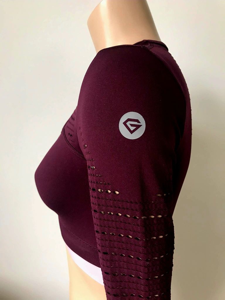 Gym Glamour krótkie top sportowy z długim rękawem
rozmiar XS