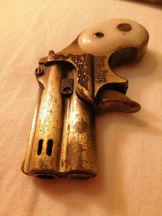 Isqueiro pistola antigo