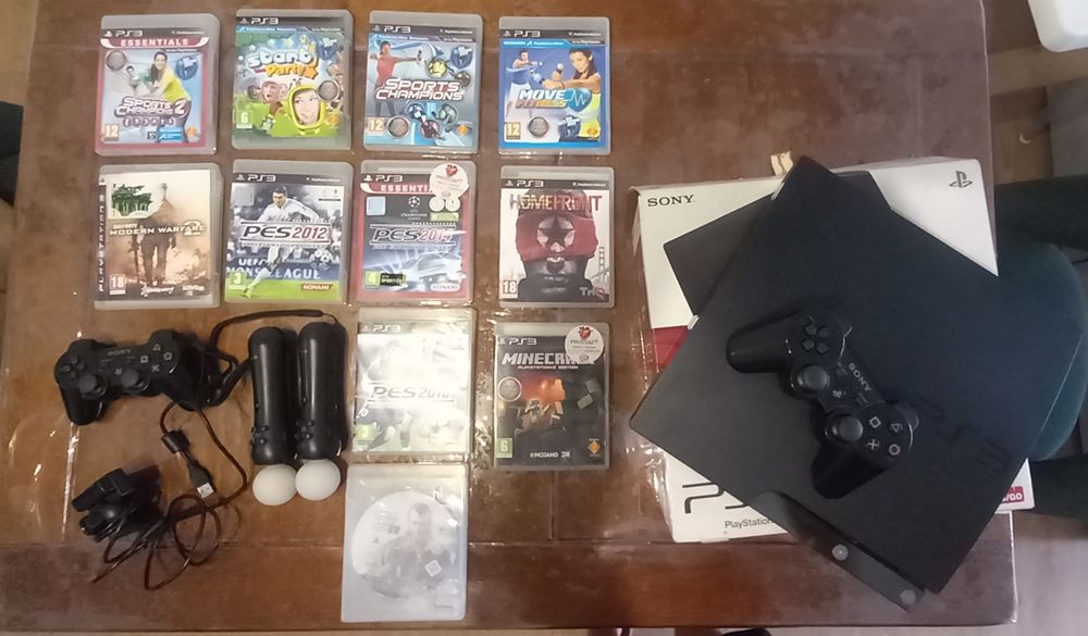 PS3 + 2 Comandos Originais + Câmara + 2 Joystick + Jogos