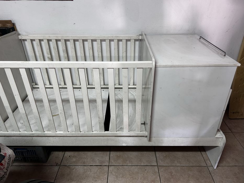 Cama de bebe com arrumacao