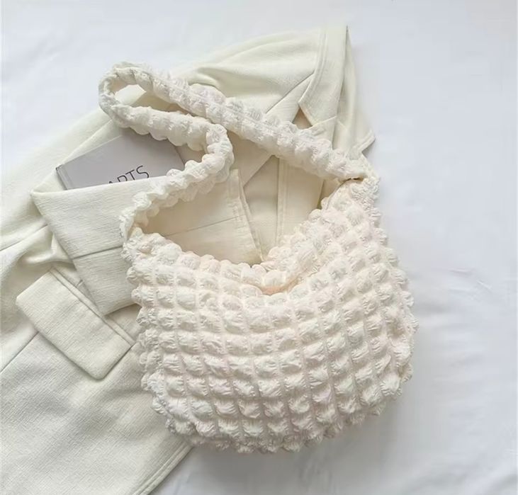 біла сумка через плече