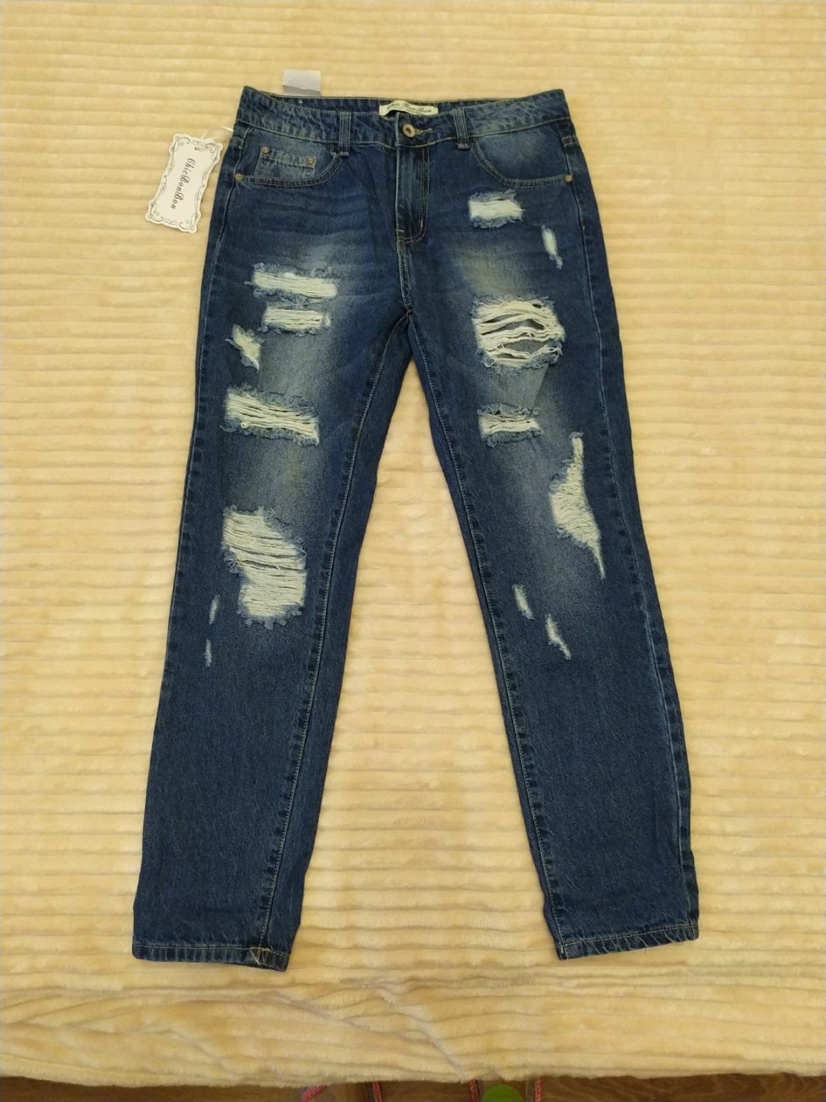 Рваные джинсы новые