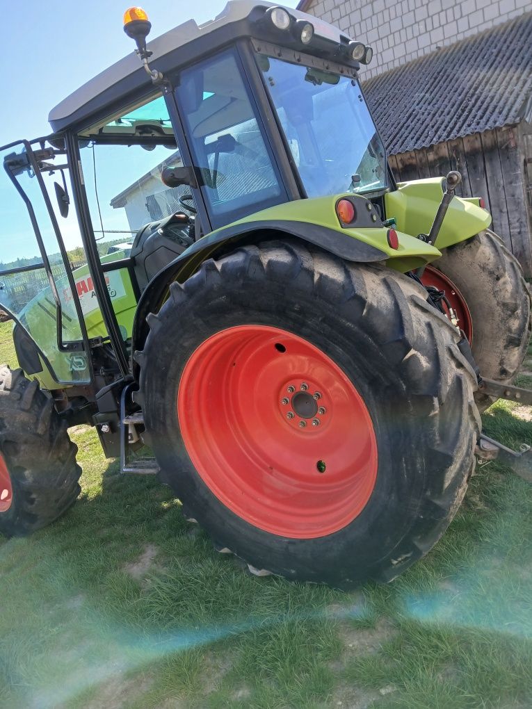 CLAAS Axos 340 cx Tur mx 100, 2009r łyżko krokodyl . 330