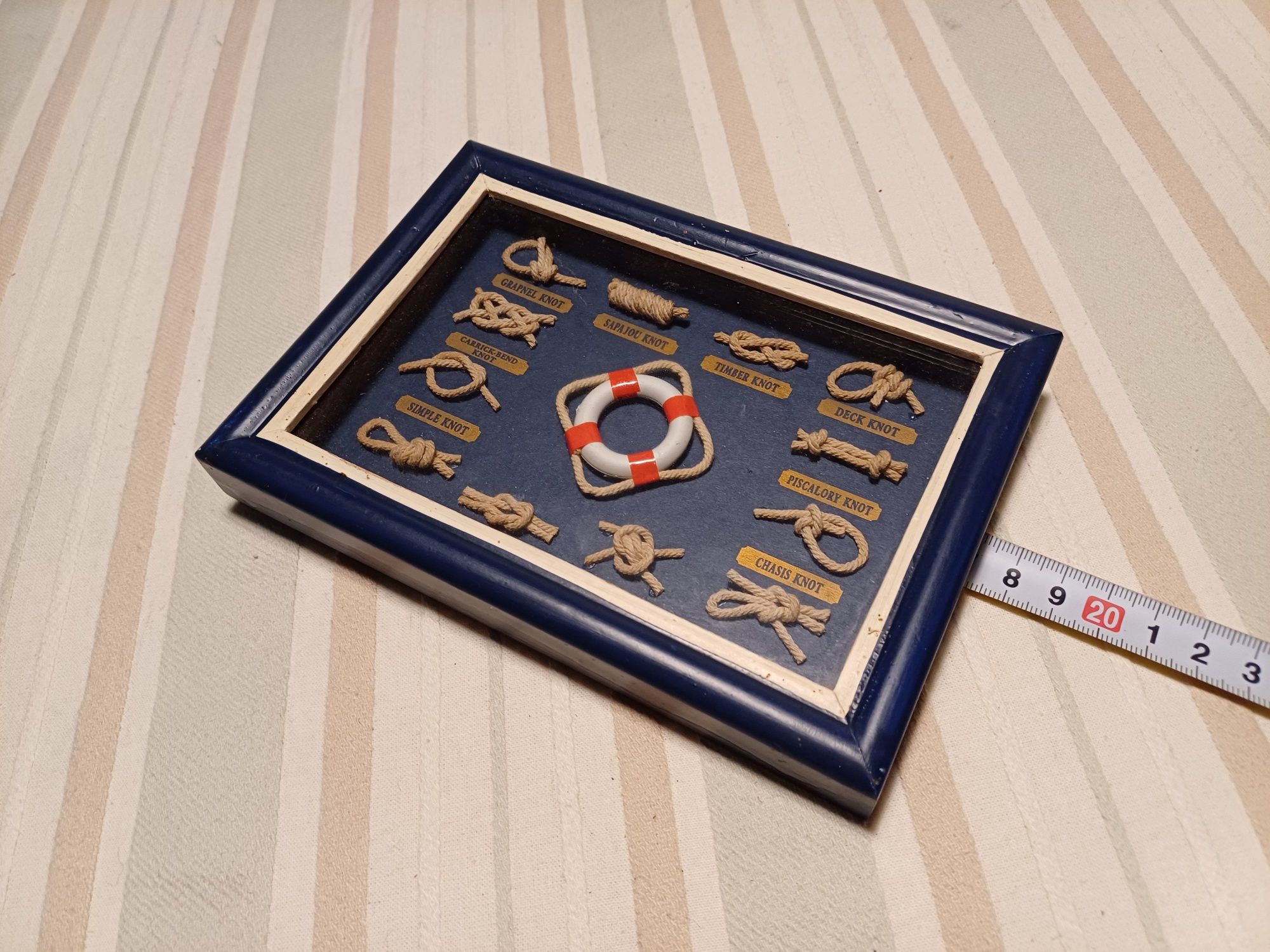Quadro de nós de marinheiro com moldura azul