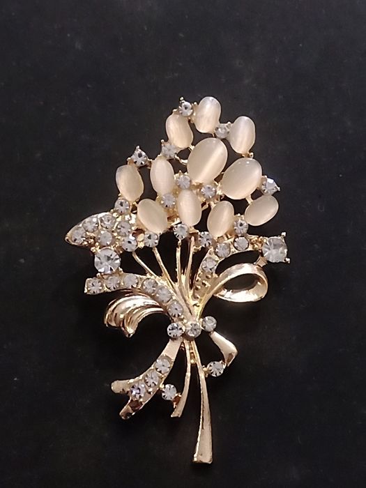 Pregadeira ou broche para casaco tartaruga ou flor