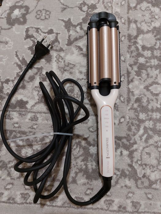 Ondulador REMINGTON 4 em 1 Proluxe CI91AW. Condições muito bom.