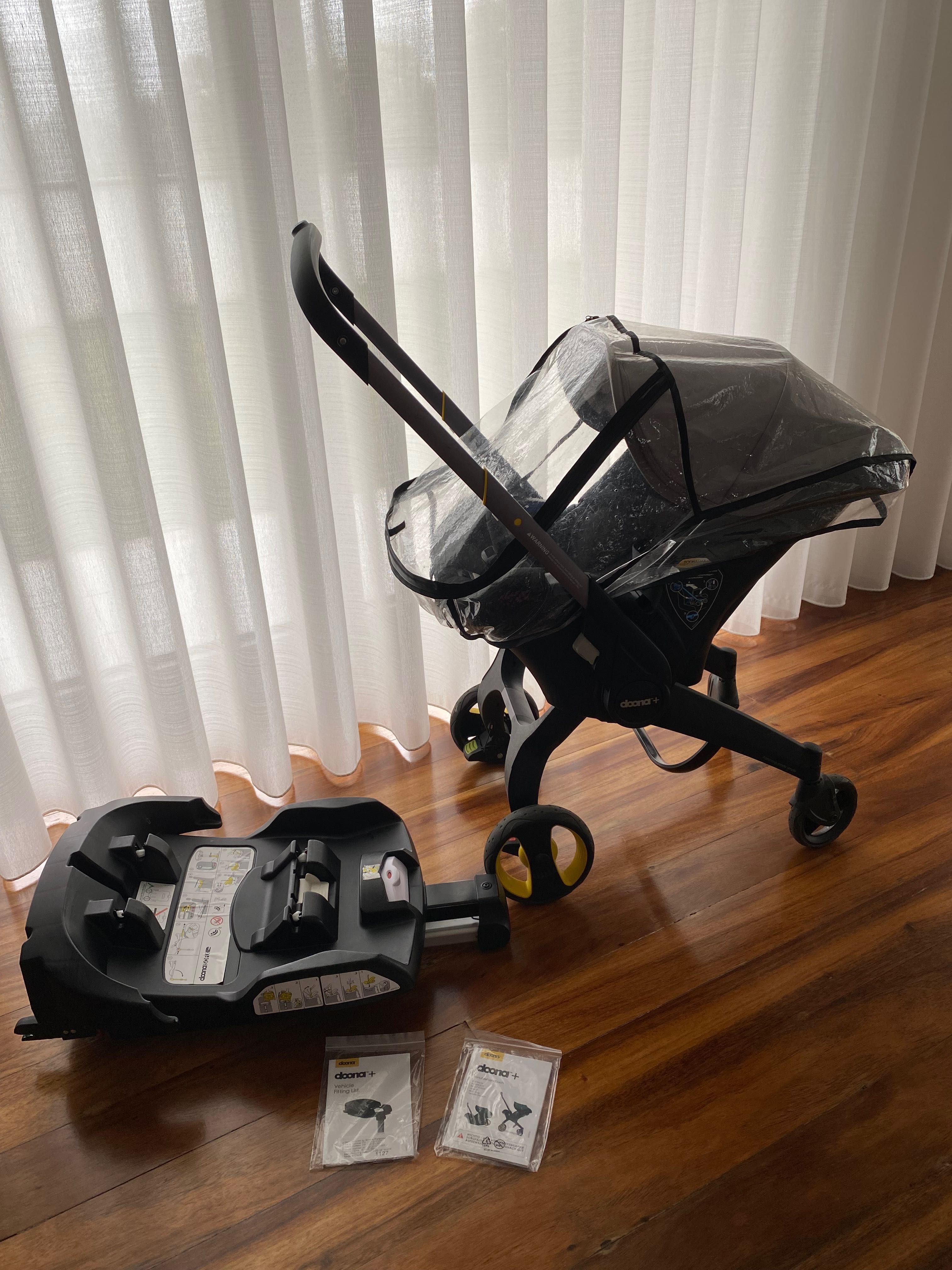 Carrinho, cadeira auto marca doona