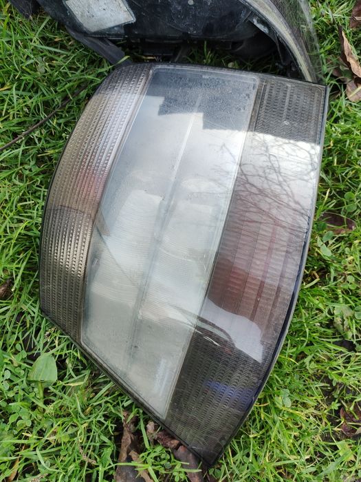 Vw golf IV 4 lampy hella magic colours czarne tylne tylnie prawa lewa