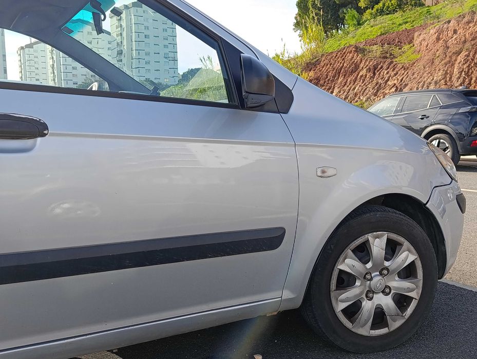 Getz 2007, AC, direção, travas e vidros elétricos