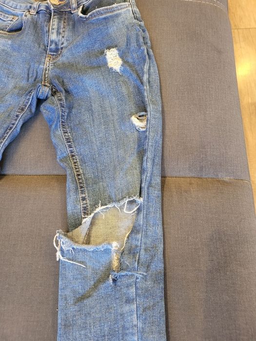 Spodnie jeansowe dziurawe 34 XS szarpane