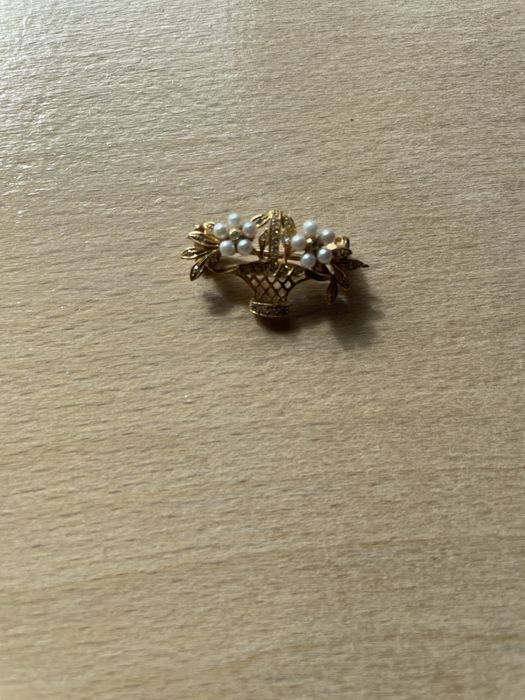 Alfinete de peito