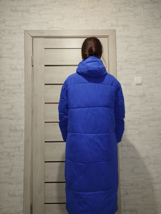 Довгий  пуховик.