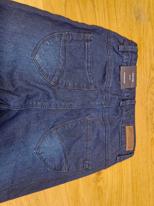Dwie pary spodni jeans 134 cm