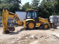 Koparkoładowarka Komatsu WB97 wynajem