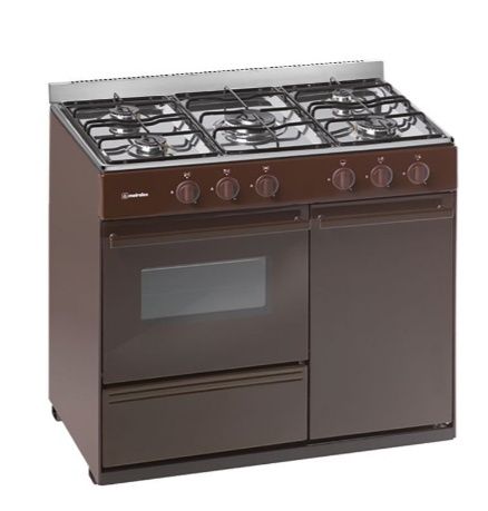 Vendo fogão  grande com porta para a bilha de gás