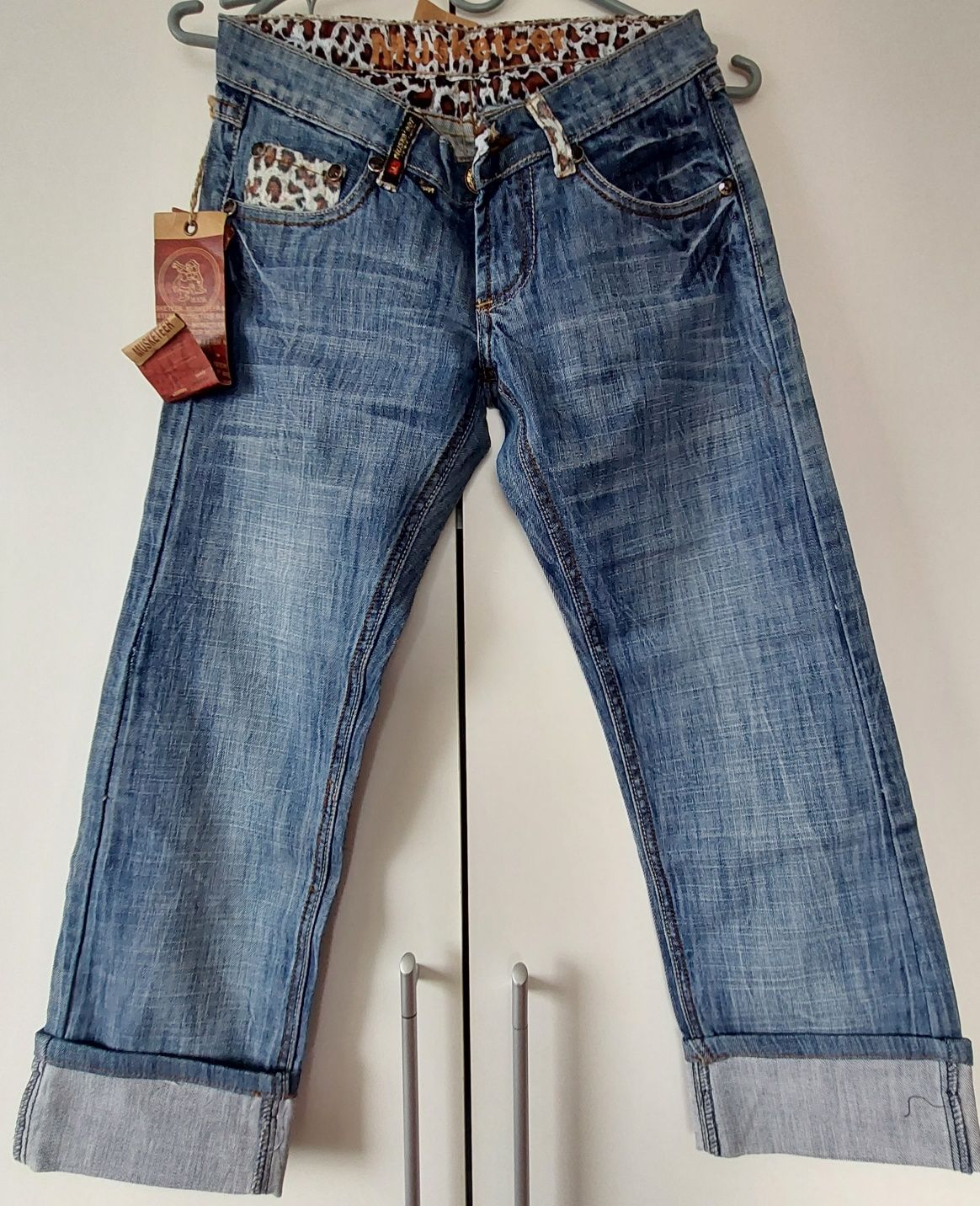 Женские фирменные джинсы