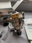 Kołowrotek Shimano Twin Power 06 Mg 2500s 3 szpule 2 korbki