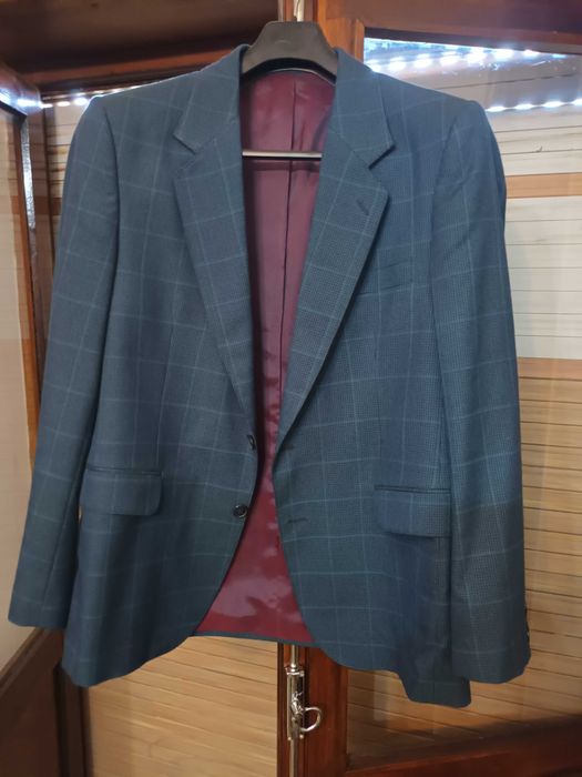 Blazer de homem azul acinzentado
