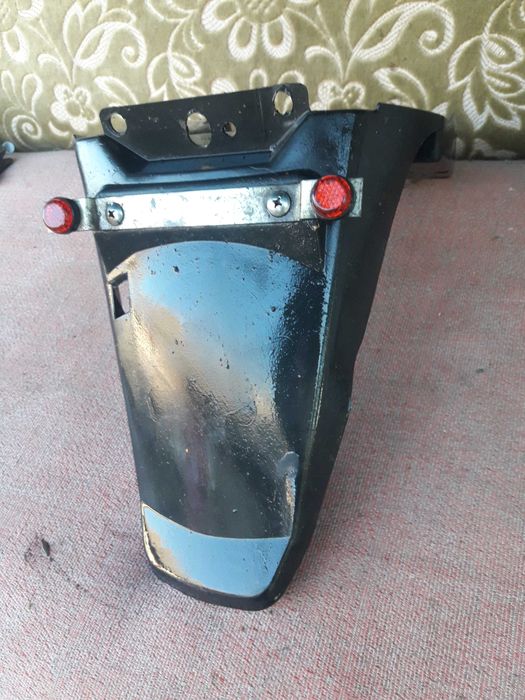 Заднє крило скутера