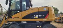 Cat M313D na części
