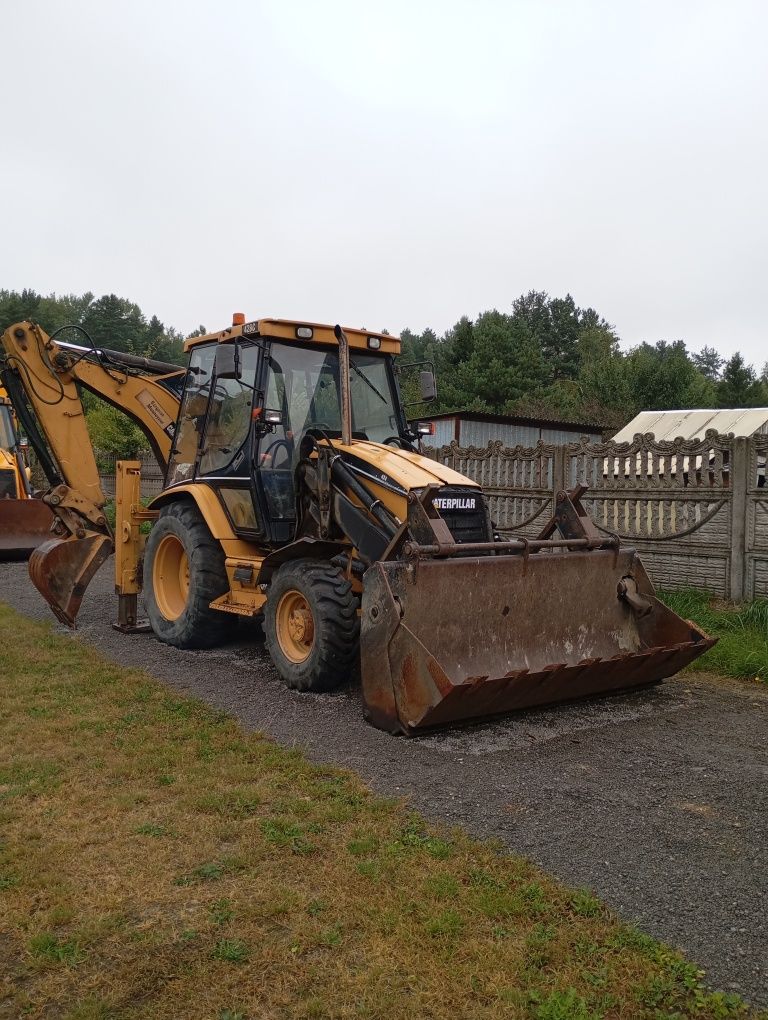 Jcb 3cx contractor umowa koparko ładowarka cat 428c