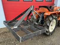Niwelator KUBOTA z poszerzeniem dokładki dwie szerokosci 120x80 204x80
