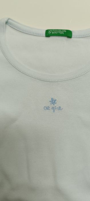 T shirt de menina marca Benetton . Usado