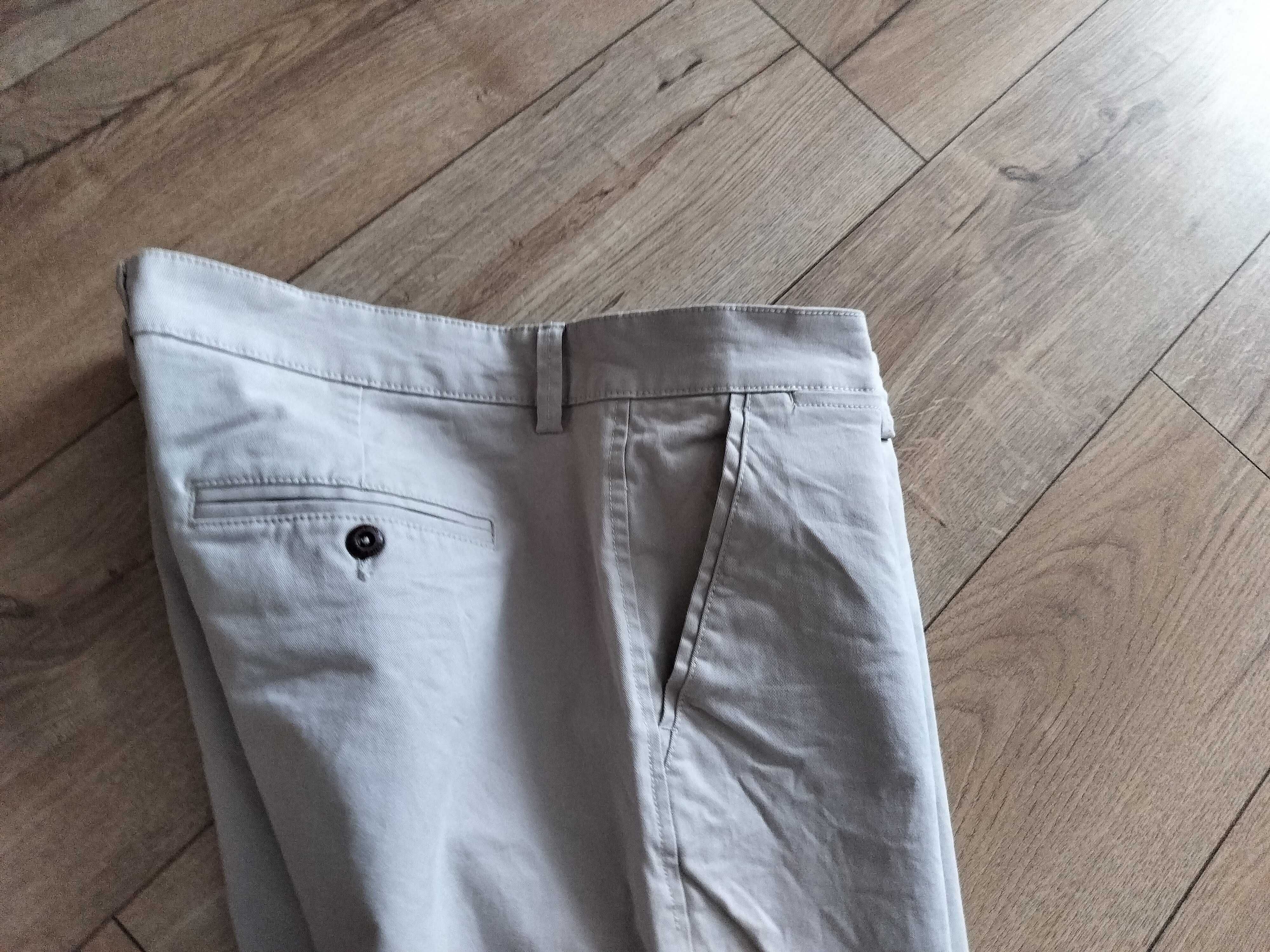 Spodnie męskie 42/32 slim fit oryginalne beżowe elastyczne pas110