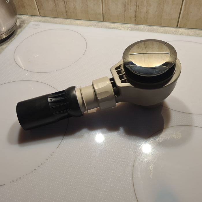 NOWY syfon brodzokowy 70 mm geberit.  Regulowany