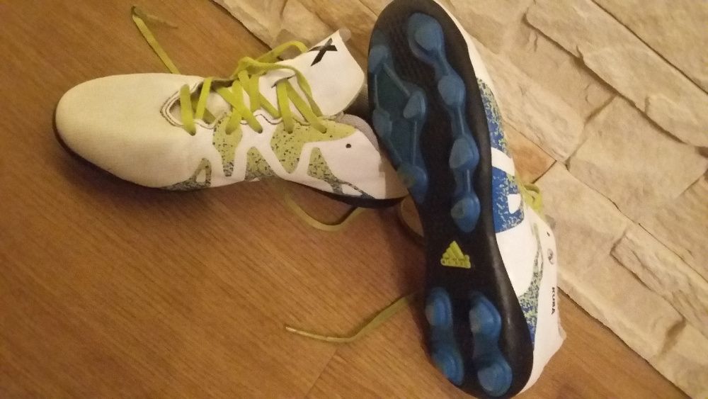 Białe korki Adidas