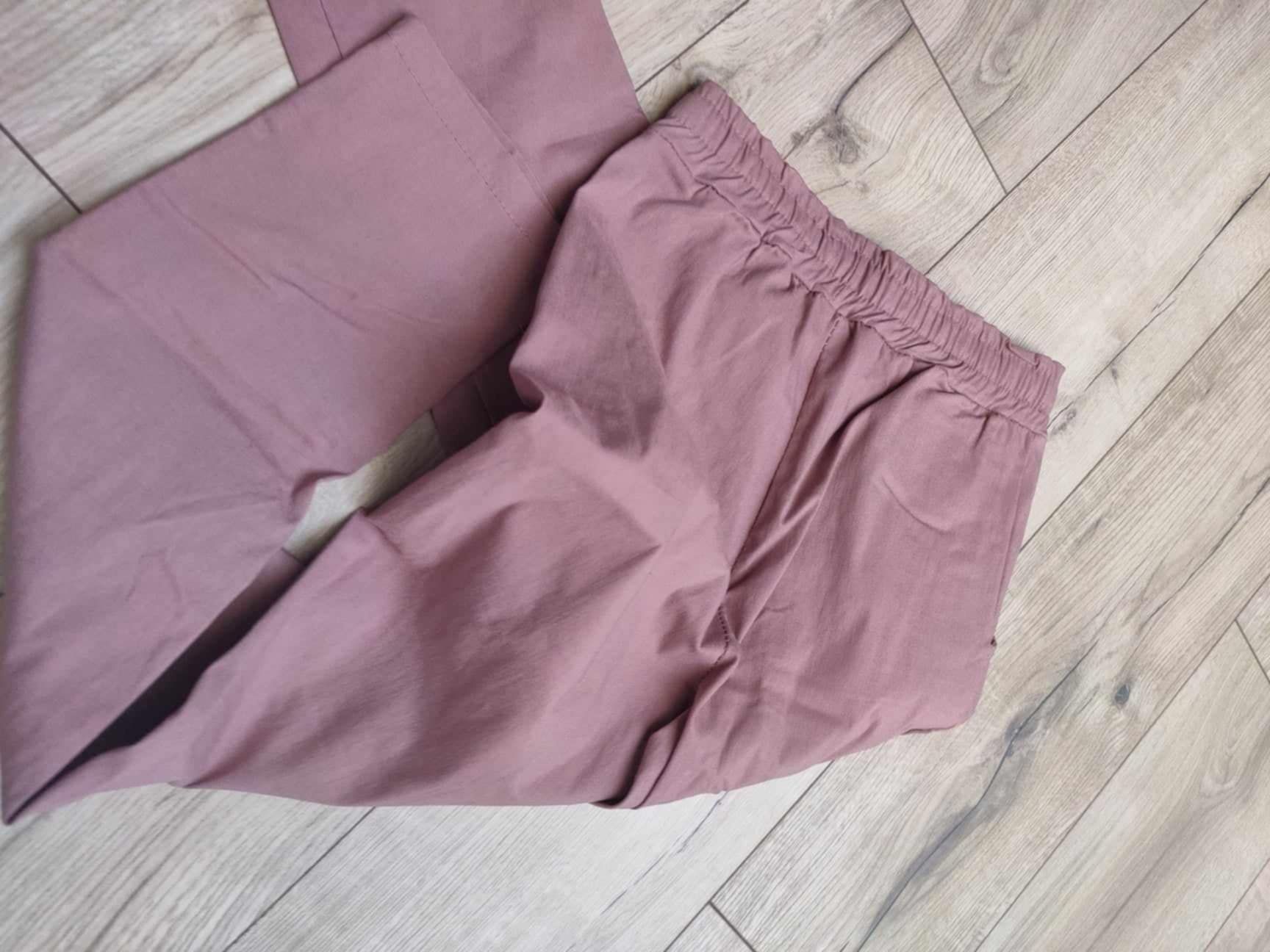 Różowe spodnie legginsy z sznureczkami ciemny pudrowy róż