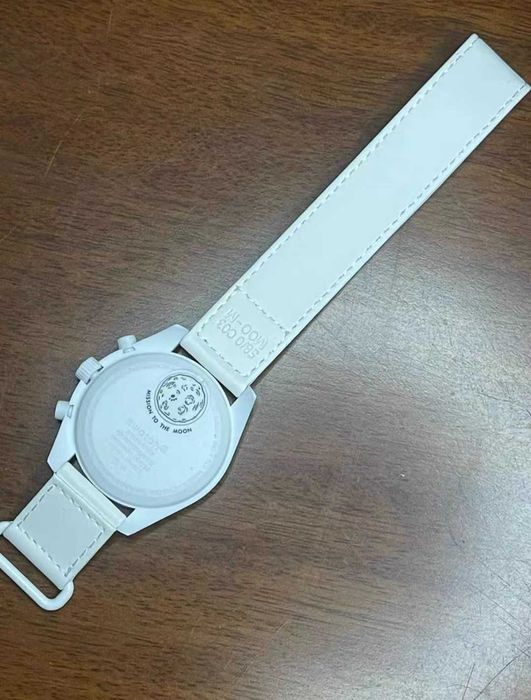 Swatch x Omega BioceramicMoonswatch MissionToMoonphase Snoopy
SO33W700