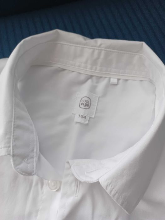 Biała koszula krótki rękaw.