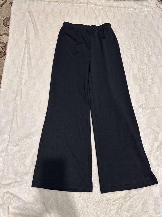 Штани в рубчик кльош