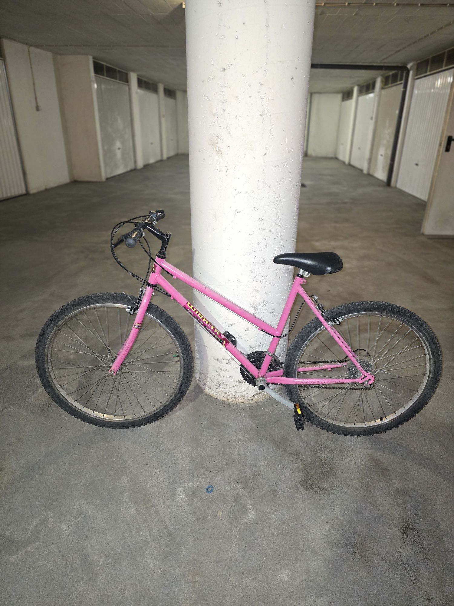 A tua bicicleta cor de rosa