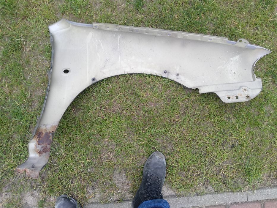 Błotnik lewy przód Skoda Octavia I kolor 9202