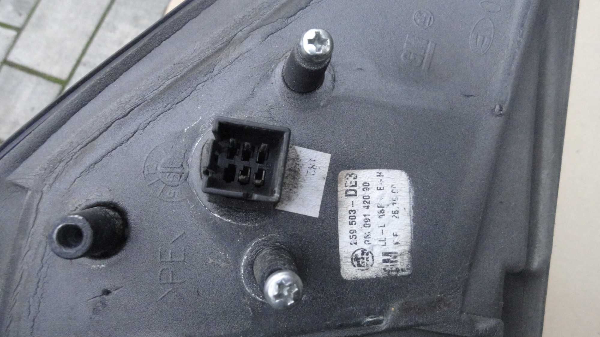 Lusterko lewe Astra 2 elektryczne czarne kod koloru Z298