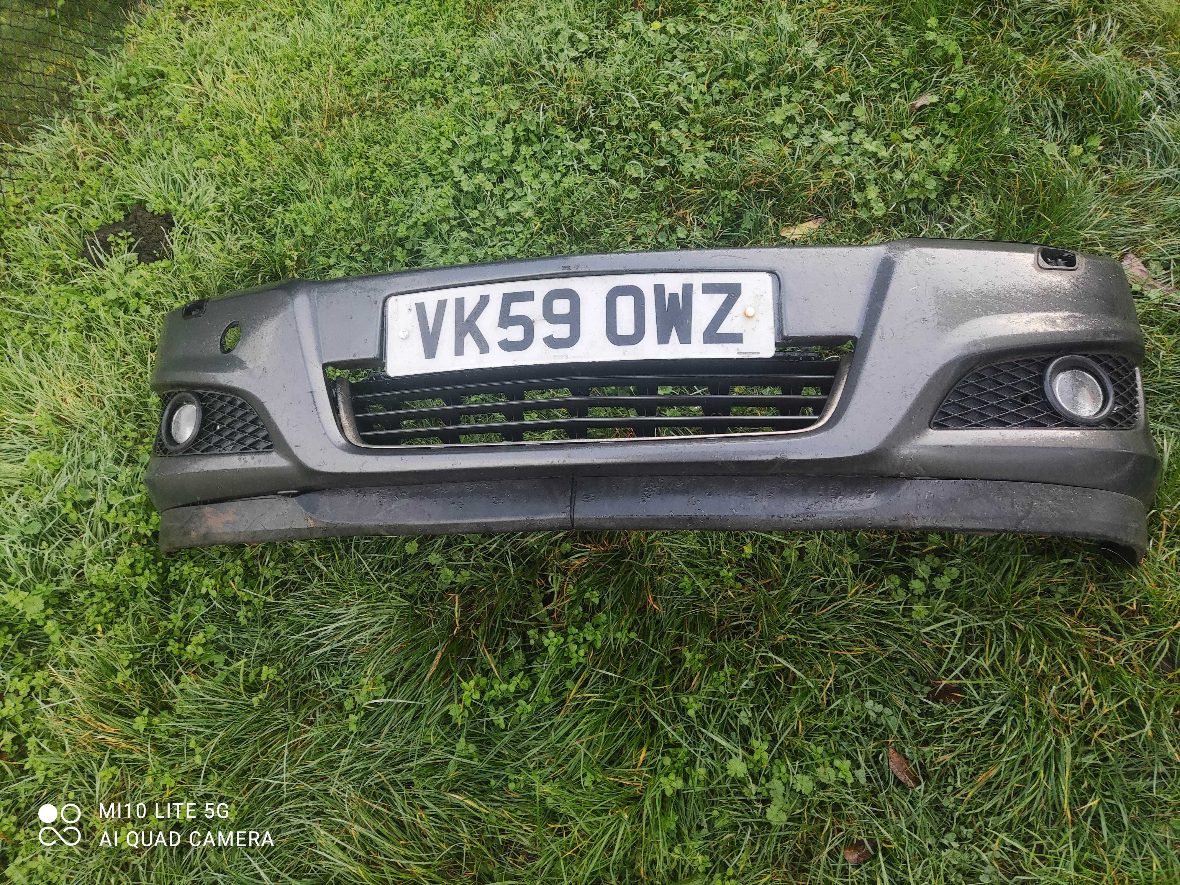 Zderzak przod Opel Astra H spryskiwacze Xenon